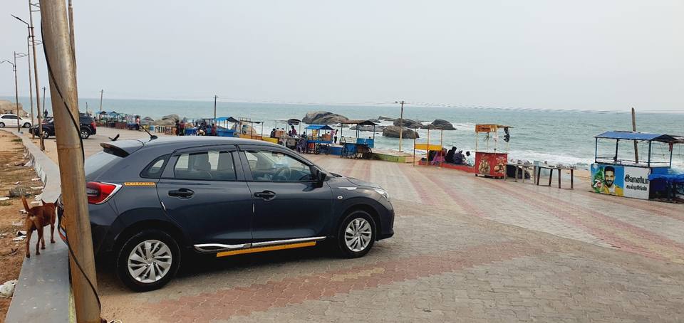 Our Glanza parked at a seafront